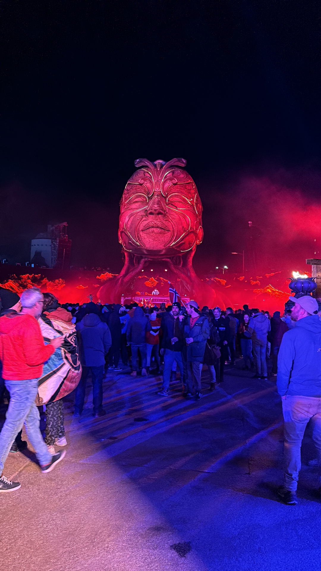 Tomorrowland mainstage at night with crowd
